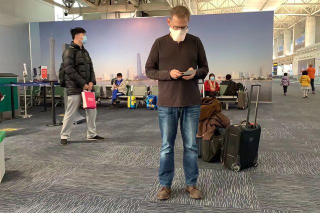 Dr. Lipkin in February at the Guangzhou airport waiting to fly to Beijing.